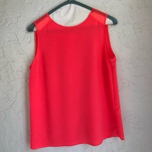 Bright pink sleeveless blouse